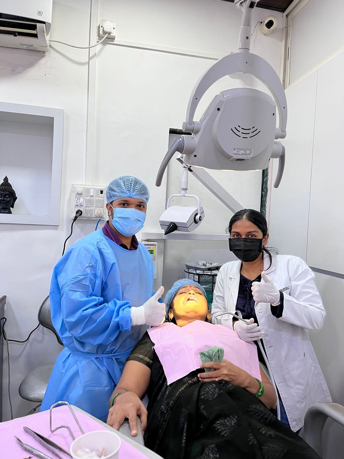 Dr. Chaudhari and team during dental treatment